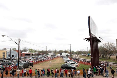 To get access to all of the complimentary activities, Fort-goers first have to wait in a long line for admission bracelets, which stretches all the way around the grounds.