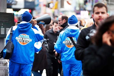To advertise its partnership with the N.C.A.A. and the first National Bracket Day, Turner Sports dispatched street teams to distribute information and bracket sheets in Atlanta, Chicago, Dallas, Los Angeles, New York (pictured), Philadelphia, and Washington, D.C., as well as at colleges including Duke University, the University of Kansas, San Diego State University, and Ohio State University.