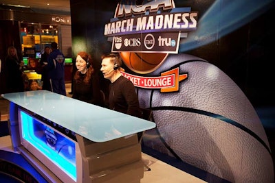 A replica of the broadcast studio in Atlanta was incorporated into the space and used for an interactive video op. Captured on camera, consumers can read lines from teleprompters detailing important moments in the competition's history and have the short clips emailed to them.