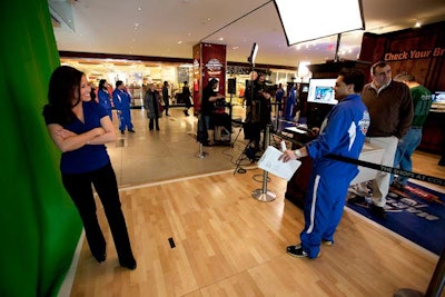 There's also a photo booth allowing visitors to pose with virtual images of Turner Sports announcers.