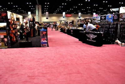 Organizers used a pink carpet to designate the Boutique, a section of the floor featuring products for pampered pets.