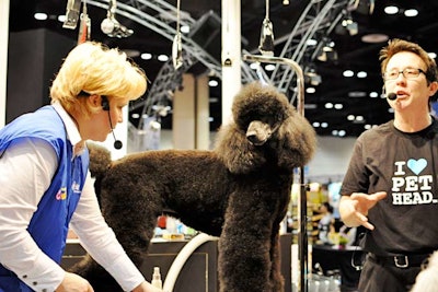 Jarden Animal Solutions used a large poodle to demonstrate its Oster line of pet grooming products.