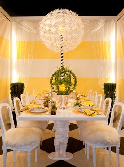 Michael Tavano Design's sunny yellow and white table had a surprise feature: Guests could flip a switch on the wall to control the motorized solar shades lining the walls. When turned on, the panels moved up and down, creating new patterns.
