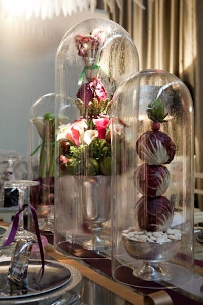 Instead of flowers, Jeffrey Brooks's table had a trio of artfully arranged towers of fresh produce covered by tall glass cloches.