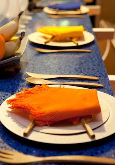 Liebherr's picniclike setting by Eric Corey Freed had bamboo plates and utensils and colorful folded napkins.