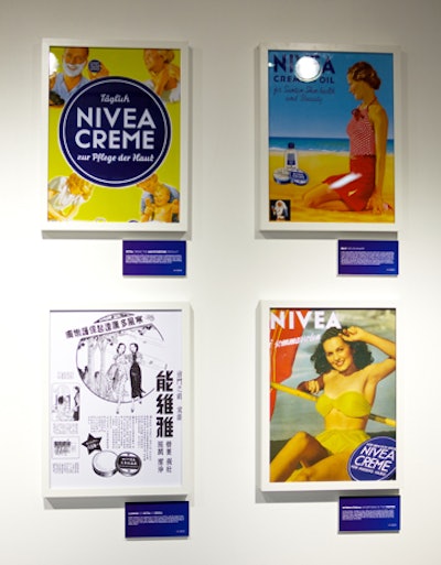 Framed ads from vintage Nivea campaigns served as decor.