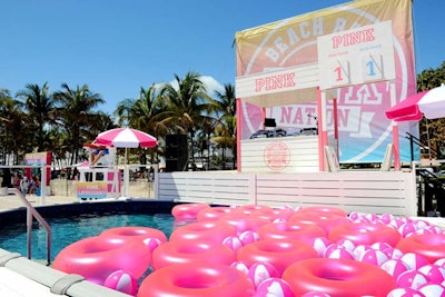DJ Irie's booth overlooked a temporary pool filled with pink inner tubes.