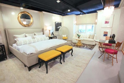 Silver and gold served as the theme for Zoe Feldman’s bedroom suite. Marbleized gold, silver, and cream wallpaper from Osborne & Little paired with a gold Baker Knapp & Tubbs mirror matched the room’s inspiration, a gold and diamond ring from Shah & Shah Appraisers.