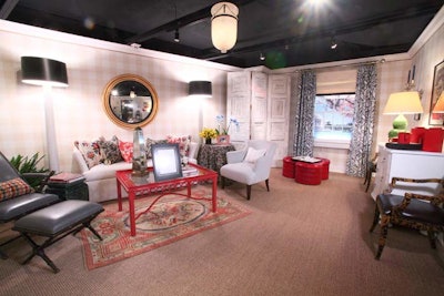 Charlotte Palmer Lekakos of Willard and Palmer Interior Design translated jeweler Ann Hand’s eagle-shaped pin into an Americana-influenced sitting room, with a red lacquer and glass coffee table, tortoiseshell armchair, and a Turkish rug in patriotic colors.