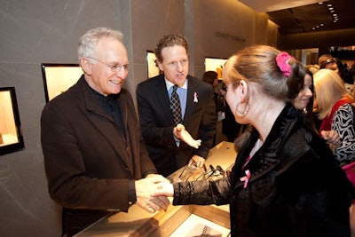 The designer greeted guests as they shopped.