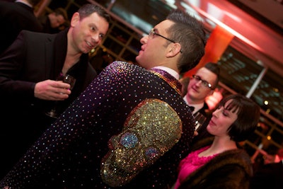 Here's associate costume designer Brian Bustos in his coat of many colored crystals.