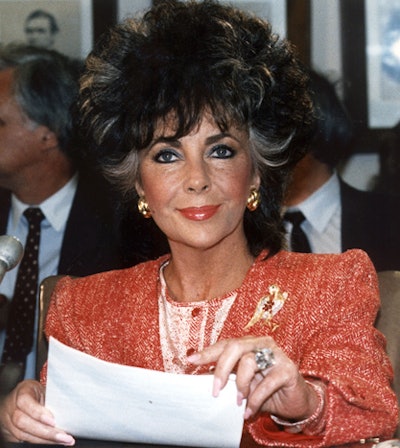 Elizabeth Taylor testifying before Congress in 1986, during a congressional hearing on AIDS. Doesn’t she look great?