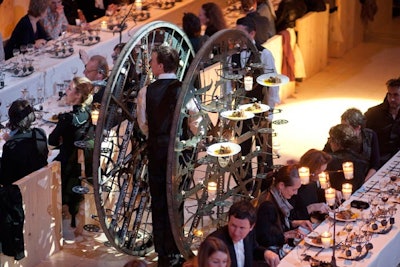 To celebrate the “year of the contemporary artisan,” Hermès kicked off 2011 with an eccentric dinner created by François Delarozière of French production company La Machine. Servers offered pepper while hanging upside down, dinner rolls sailed through the air via catapult, and guests grabbed dishes from a giant wrought-iron wheel, among other surprises.