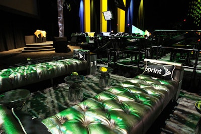 To create a vintage movie theater feel, designers used black with accents of white, metallics, and Sprint's signature golden yellow.