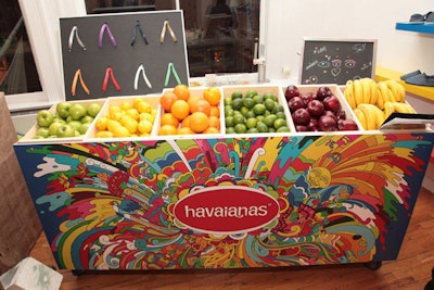 As a fun way to incorporate a station for editors to personalize a pair of flip-flops, Havaianas created a fruit stand, matching the colors of the sandal straps to the hues of fruits on display.