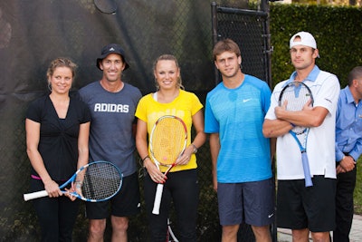 The stars of the Ritz-Carlton Key Biscayne's 2nd annual All-Star Charity Tennis Event: Kim Clijsters, Darren Cahill, Caroline Wozniacki, Ryan Harrison, and Andy Roddick.