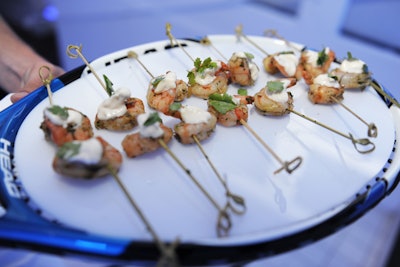 Passed hors d'oeuvres by Great Expectations Catering at the Xperia PLAY launch included shrimp skewers with a seasoned butter sauce.