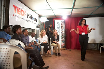 Attendees expanding the community conversation at the TEDxKibera salon in January 2011.
