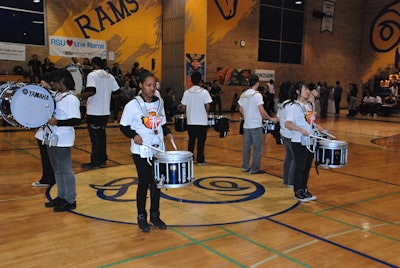 The C.W. Jefferys Collegiate drum line performed at halftime.