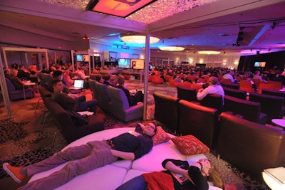 TEDActive, the main conference's hybrid spin off, is a more informal environment, providing bean bags and beds for attendees to lounge on and watch speaker presentations.