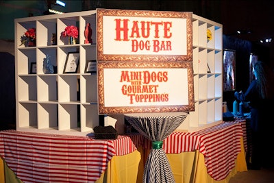 Staff from Good Food Catering Company served sliders and mini corn dogs inside custom cubes at the Haute Dog Bar.
