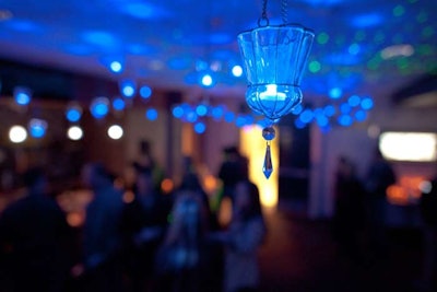 Art of Imagination hung candlelit blue lanterns from the ceiling of the conference room.