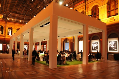 Before the meal commenced, the rectangular space's screen walls rose to reveal the dinner setting within.