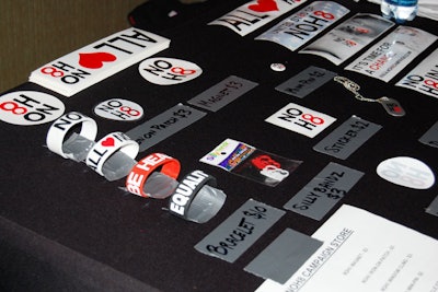 Guests shopped NOH8-branded stickers, patches, and T-shirts in the lounge.