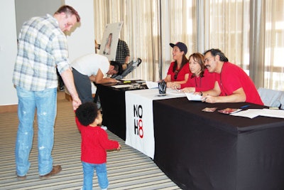 Volunteers greeted guests as they signed up for a place on the waiting list to be photographed.