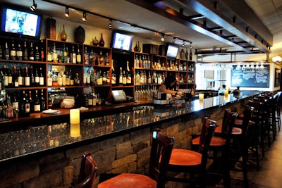 There are several TVs at the full bar and seating for 20.