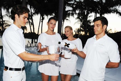 Waiters adhered to the all-white theme of the second event at a private residence on Miami's Hibiscus Island.