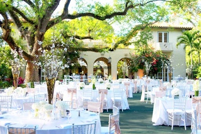Oak trees in the front yard provide shade for daytime events held outdoors.