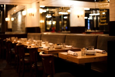 Inspired by a classic French bistro, Paris Club's decor includes mirrors scrawled with house specials.