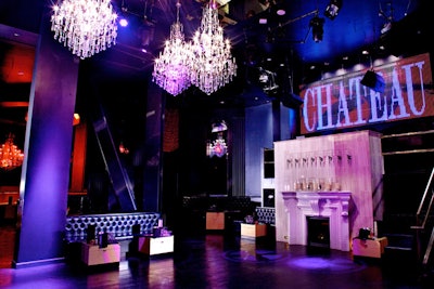 There are vaulted ceilings, top-end lighting and sound systems, ornate chandeliers, and a DJ booth centered above a 10-foot-tall marble mantel fireplace.