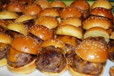 Two buffet tables at either end of the event space had various finger foods like mini sliders, three kinds of grilled cheese, sweet potato fries, and mini andouille sausage corn dogs.