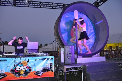 Global Inheritance's programming required guests to use their bodies on human-size hamster-type wheels to power musical sets.