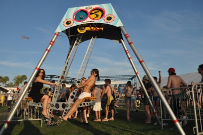 Global Inheritance showed off its lineup of innovative eco-friendly programming, including a new 'energy swing,' which implored fans and festivalgoers to generate power.