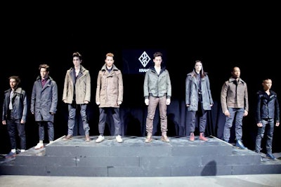 Krane Design showed off its rugged menswear designs and 'utilitarian manbags' in the studio space. As models walked down the runway, they grabbed bags and coats off of hooks suspended from the ceiling, while street dancers tossed the bags back and forth between moves.
