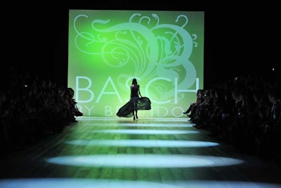 The Basch by Brandon show had the runway swathed in green and purple tones to match the designer's new collection, while models played up the sexiness factor, strutting to tunes by Rihanna and Christina Aguilera.
