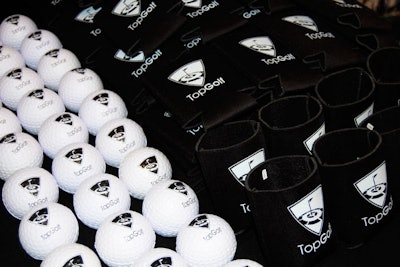Local golf entertainment center Top Golf sponsored a table at the event giving away branded koozies and stress balls.