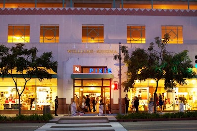 Decor included window displays with the machines and oversize versions of the coffee capsules, as well as a three-dimensional Pixie and Nespresso sign matched to the Williams-Sonoma's glass awning.