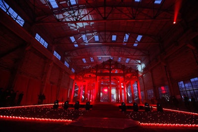 Once a pipe factory, the studio of artist Zhang Huan encompasses 35,000 square feet in the Shanghai countryside. The site, which housed the dinner, performance, and after-party, boasts 50-foot ceilings and an original Ming temple.