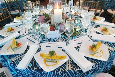The planning and design team made the most of Bobbi Brown's scarf design by using the pattern to create custom tablecloths for the dinner tables.