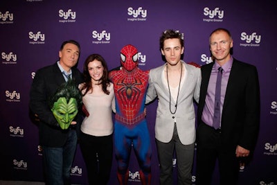 On March 22, Syfy took over the Foxwoods Theatre, parlaying its media sponsorship of the musical Spider-Man: Turn Off the Dark into the site and entertainment for its 2011 upfront presentation. On the red carpet, guests could pose with a costumed staffer and Green Goblin mask.