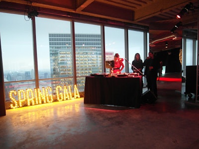 A custom sign stood against the windows next to the DJ booth. Alexandra Richards played tunes during the cocktail hour; for the after-party, which she co-chaired with Interview magazine and Chandelier Creative, DJs Harley and Cassie spun music.