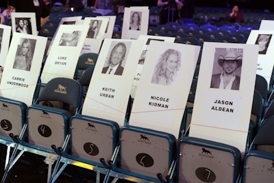 Celebrity seat place cards were displayed during rehearsals.
