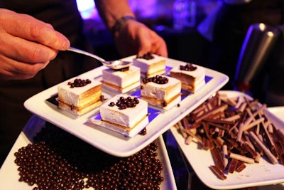 The Walt Disney World Swan and Dolphin Resort's executive pastry chef, Laurent Branlard, served grown-up s'mores made with a coconut sable cookie and marshmallows filled with sauteed bananas and sea salt caramel cream, and topped with dark chocolate foam and vanilla coconut sauce.