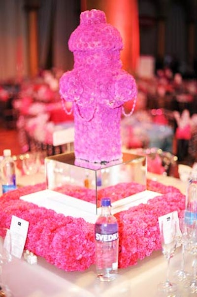 Edge Floral Event Designs created fire hydrant- and bone-shaped centerpieces for the V.V.I.P. dinner tables.