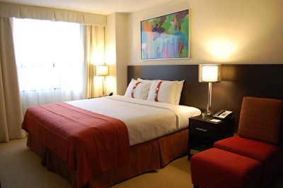 Renovated rooms include an open layout and modern look, including paintings by Canadian artist Neil Young.