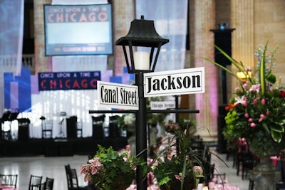 Joseph Leigh Designs topped tables with streetlamps and signs.